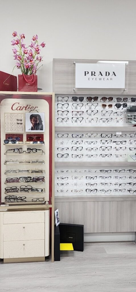 Prada Eyewear and Cartier frame displays in the Reel Optics showroom